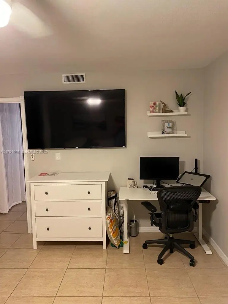 Master bedroom with office desk space for remote workers